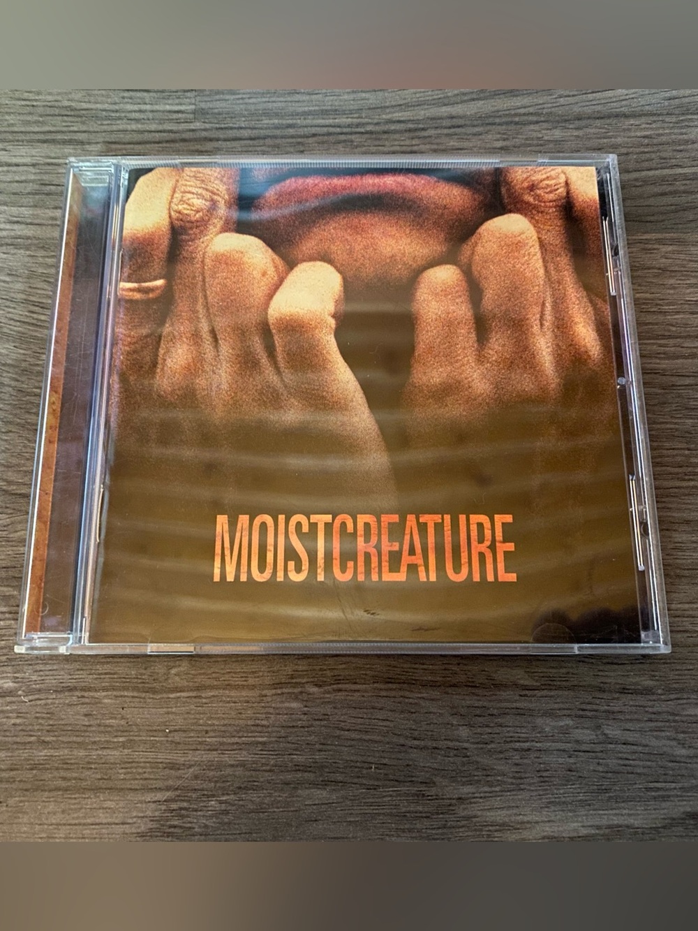 MoistCreature CD — Orange Cover Art